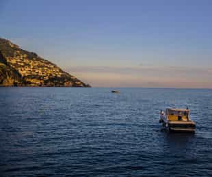 Sail by private boat along the Amalfi Coast