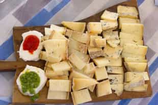 Taste cheeses at a local dairy outside of Bologna