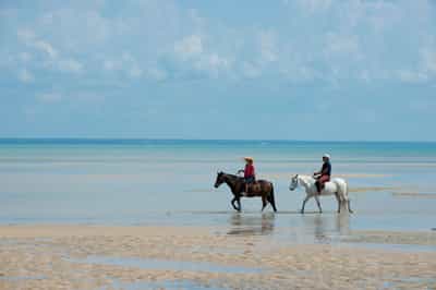 Take a horse ride on Benguerra Island's beaches