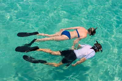 Snorkel in the azure waters of Buenguerra Island