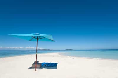 Picnic on the beach under the palms in Mauritius