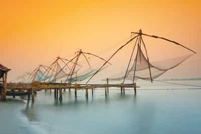 See the iconic Chinese fishing nets in Cochin