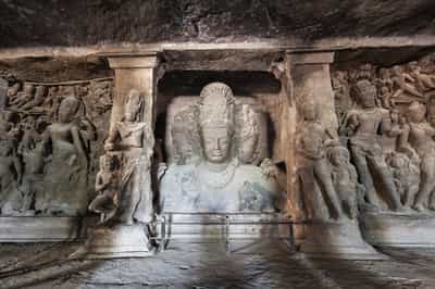 Take a boat to visit the Elephanta caves in Mumbai