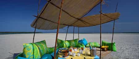 Sand bank is magically revealed at low tide and is perfect for relaxing and swimming.