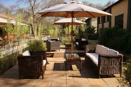 Tucked away in the outskirts of Livingstone, you’ll find Protea Hotel Livingstone and if you travel just 10km from this stunning hotel, you’ll find the epic Victoria Falls or, as the locals affectionately call it, Mosi-oa-Tunya, ‘the smoke that thunders’.