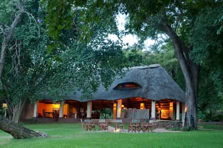 The main Lodge is a charming thatched structure, consisting of a lounge, dining room and bar area.