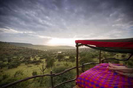 Overlooking the Kiboko waterhole, sunrise at the Star Beds is always spectacular