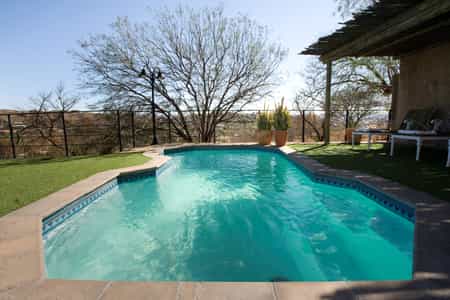 Beat the heat of a Namibian summer by cooling down in a sparkling blue  swimming pool!