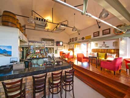 The bar, crafted around and between reminders of a bygone era.