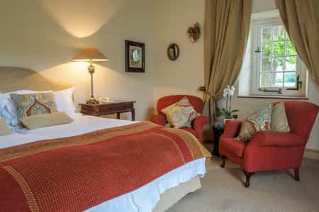 This lovely room is one of two standard twins.  It can also be made into a standard double.  This spacious room has a beautiful painted ceiling and en suite bathroom with separate bath & shower, plus his & hers basins.