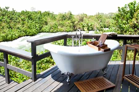 All Villa suites have a bath on the outside deck overlooking the Nile