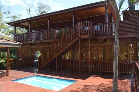 Log cabin with private splash pool
