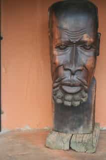 One of the beautiful hand carved wooden esculptures in our Garden.