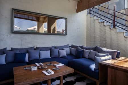 New mango wood Lounge furniture and Mirrors reflecting Aravalli Moutains introduced at Bar deck