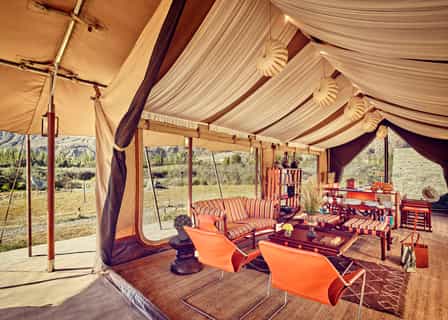 Each of our campsites has a reception tent Meet fellow guests in the lobby, which is a perfect place to share stories and experiences. Turn to our Guest Relations Executive, who will help address your every need Confer with our In-House Tour Manager to customise the daily itinerary to include your special interests Shop for the best of regional handicrafts at the boutique Enjoy undisturbed Wi-Fi connectivity Connect your iPods to the docking station and groove to your choice of music Have some family fun with indoor board games Explore our in-house library